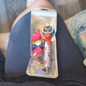 Vibrant Beaded Pen with Rainbow Accents